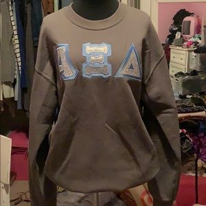 AXID stitched glitter letter crewneck